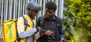 A Glovo delivery courier with a Karaa electric bike