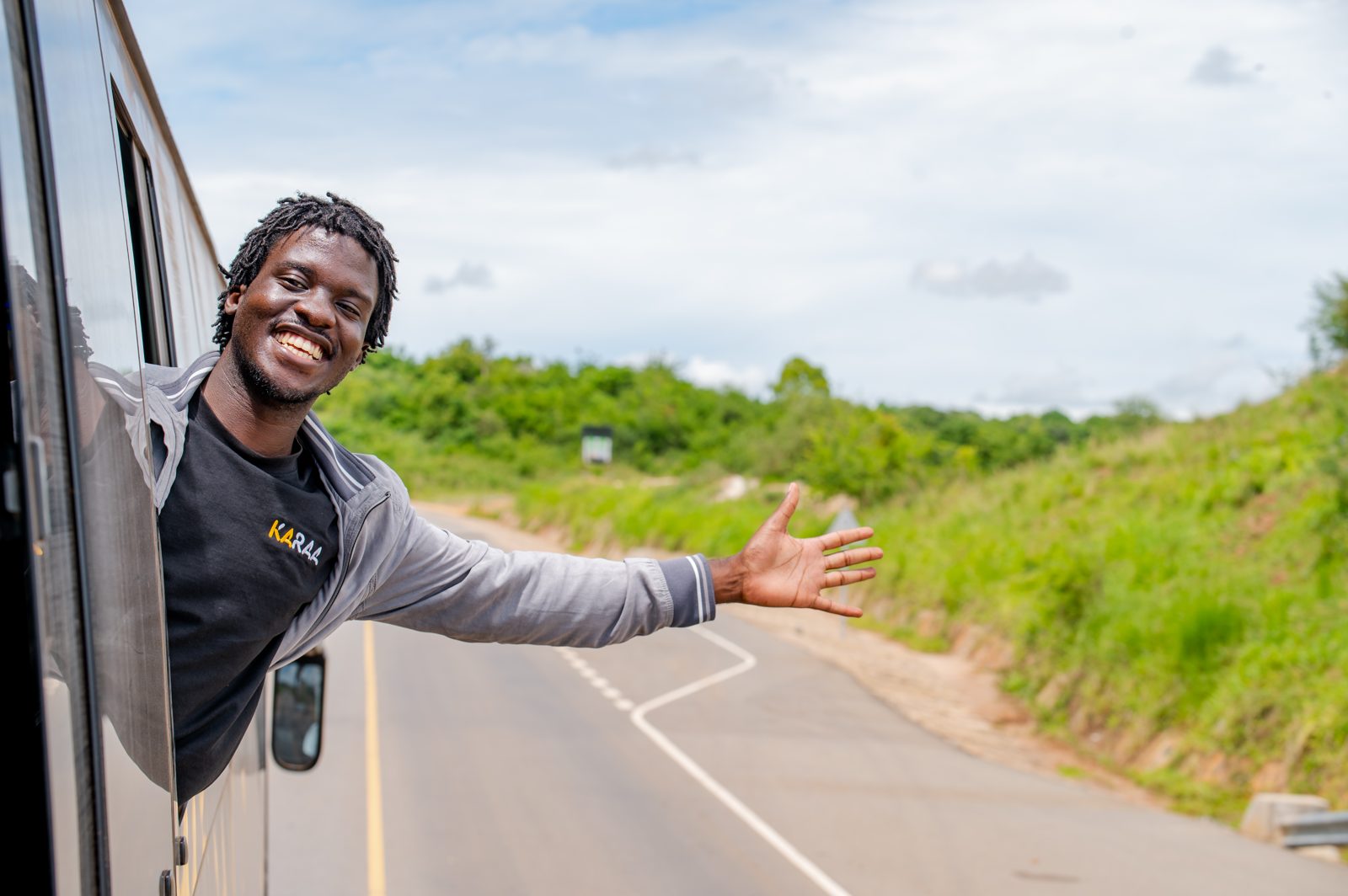 A Karaa team member in a branded jacket on the road to the launch