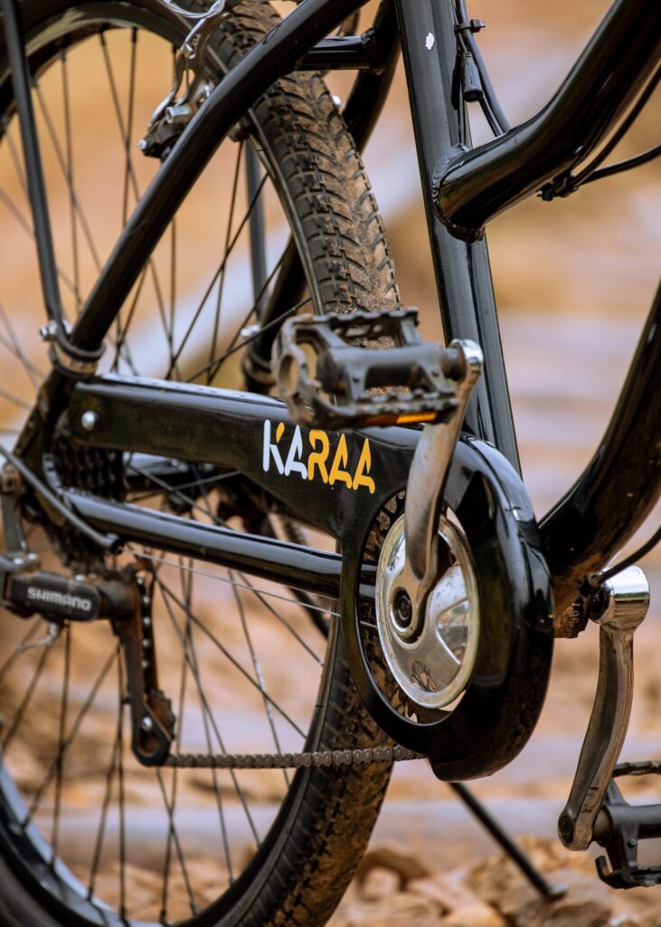 Close-up of the crank and pedals on a Karaa electric bike