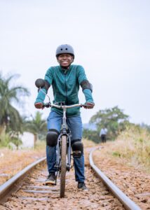 Karaa rider riding an electric bike toward the camera