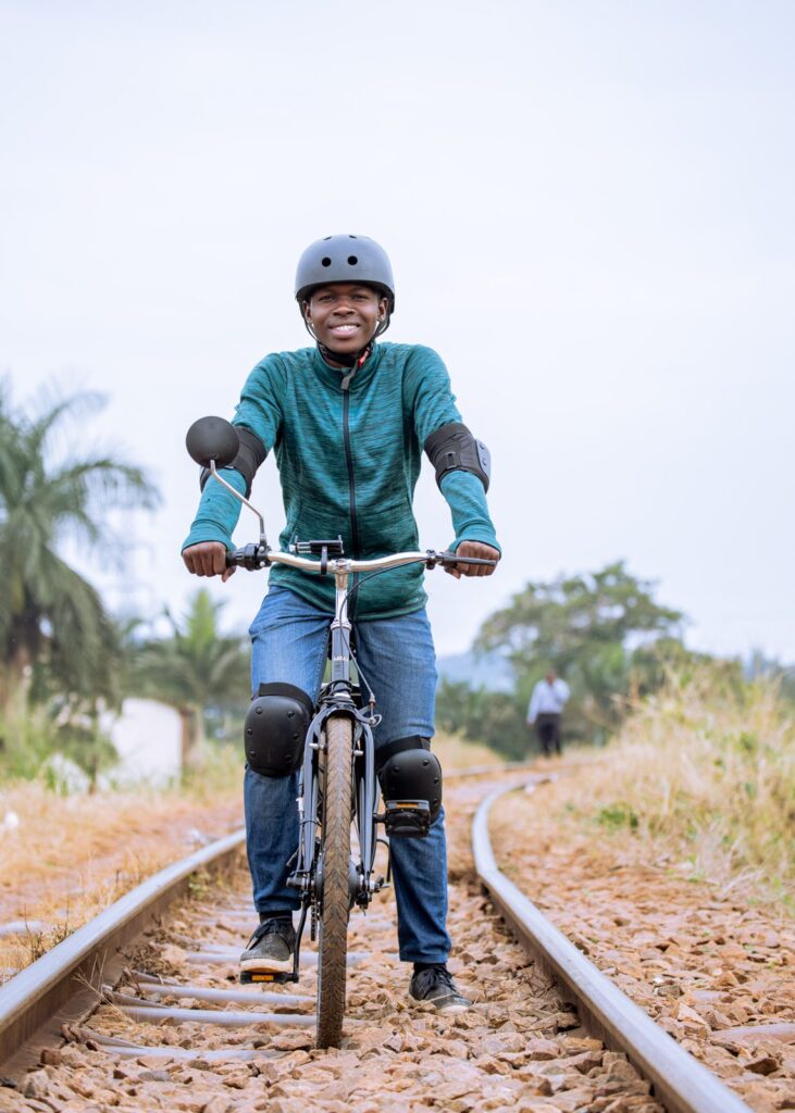 Karaa rider riding an electric bike toward the camera